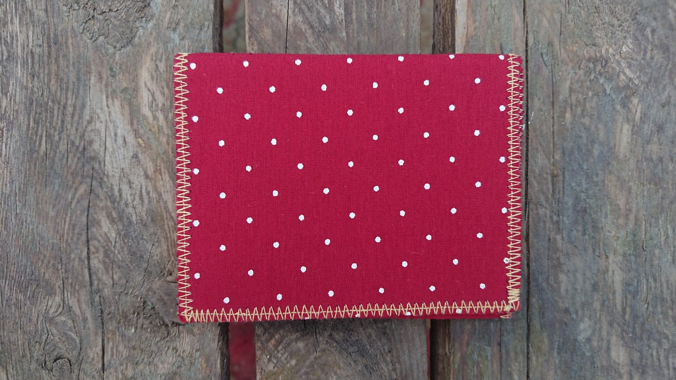 A one-of-a-kind wallet called "Dot E Yeah" is made by Highsew. It is made of recycled fabric combined with new, strong fabric. foldable.