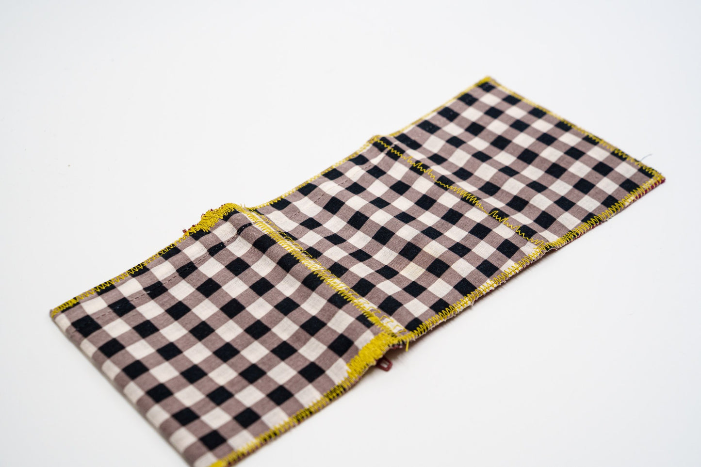 Checkered exterior of one-of-a-kind upcycled wallet — HighSew