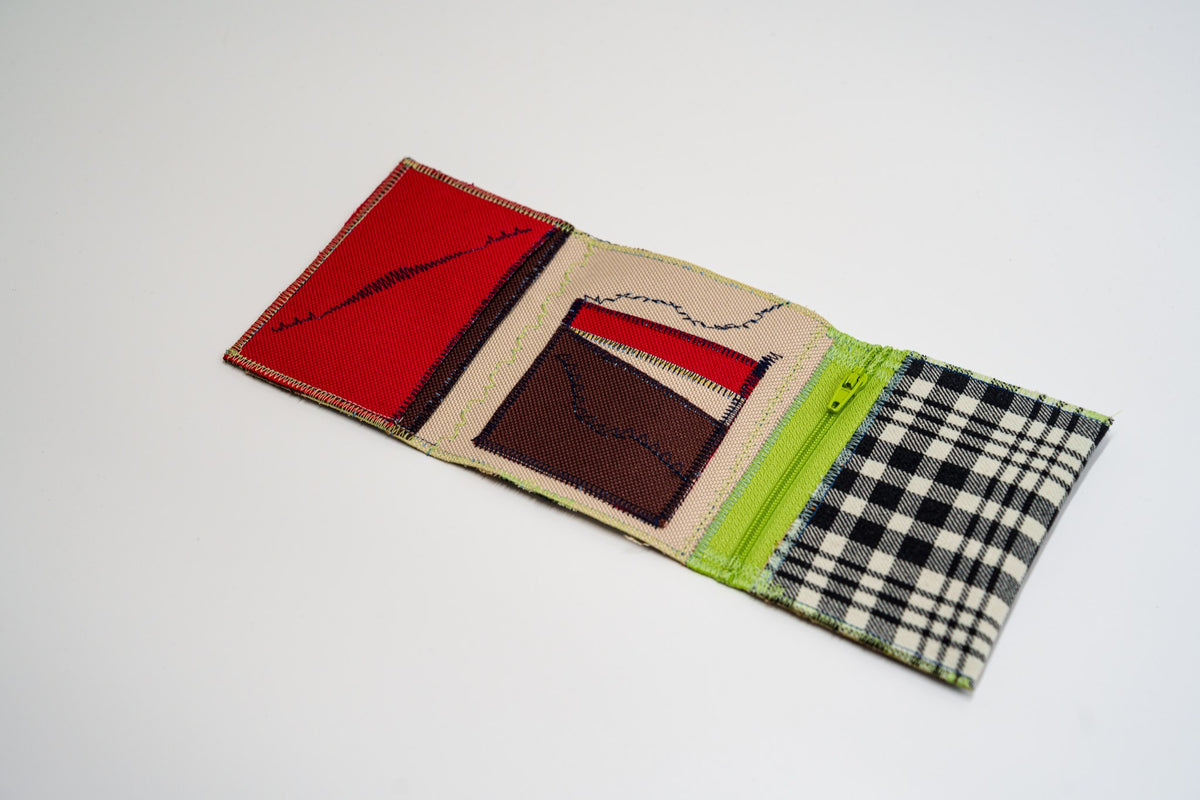Open wallet interior with red, brown and sand panels, signature stitching and lime-green zip — HighSew
