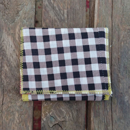 A one-of-a-kind wallet called "Black, Grey and White" is made by Highsew. It is made of recycled shirt fabric combined with new, strong fabric. foldable.