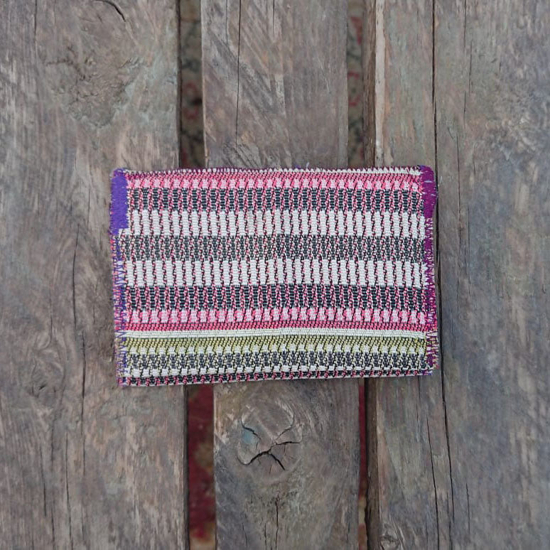 A one-of-a-kind wallet called "Blurred Lines" is made by Highsew. It is made of recycled fabric combined with new, strong fabric. foldable.