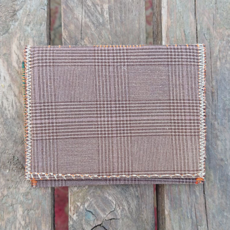 A one-of-a-kind wallet called "Drink & Evening" is made by Highsew. It is made of recycled old pants fabric combined with new, strong fabric. foldable.