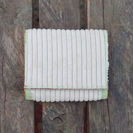 A one-of-a-kind wallet called "Fluffy" is made by Highsew. It is made of recycled sofa cover fabric combined with new, strong fabric. foldable.