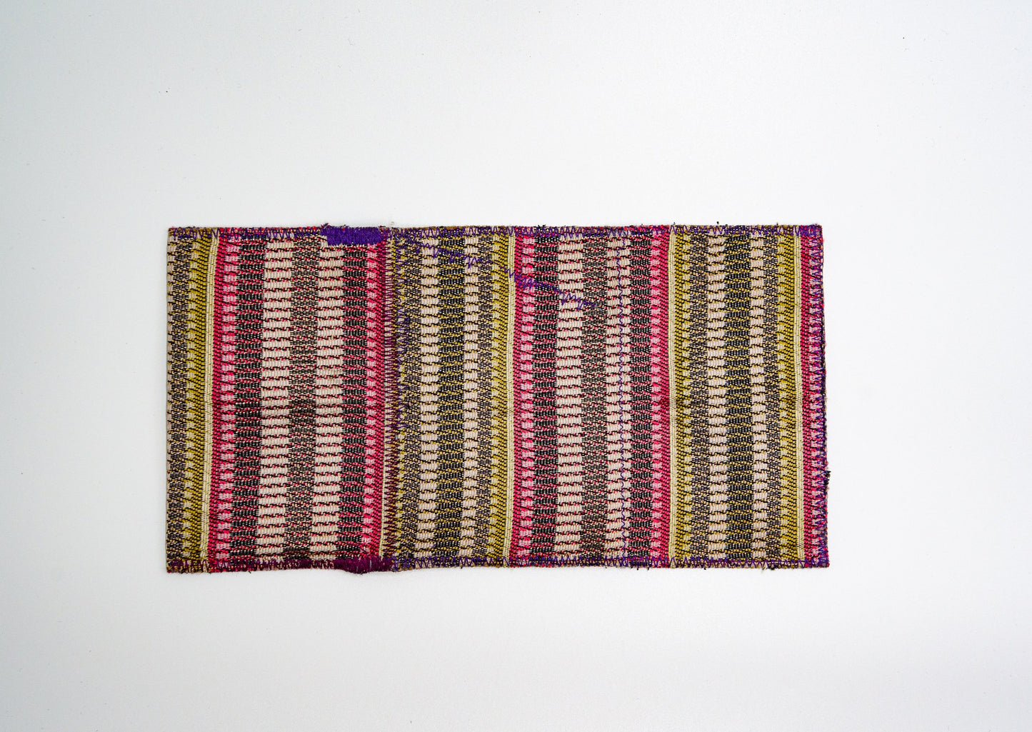 Woven striped exterior of one-of-a-kind upcycled wallet — HighSew