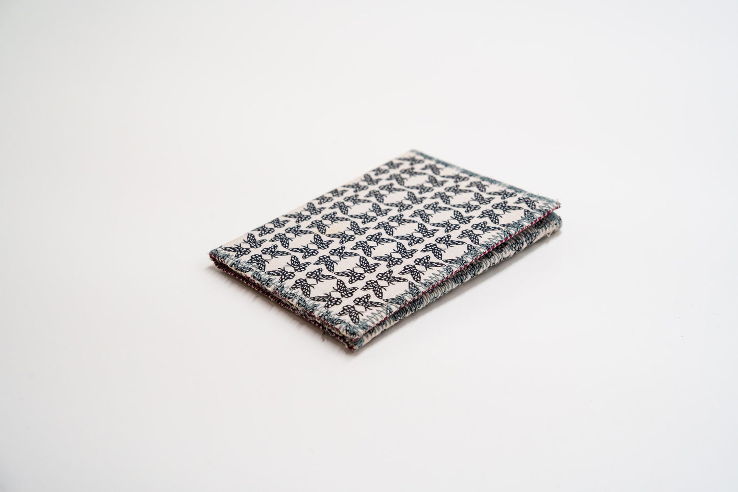 Butterfly-print wallet in cream and black, handmade from upcycled fabric — HighSew