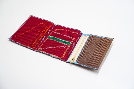 Open wallet interior with deep red lining, green accent panel and colored stitching — HighSew