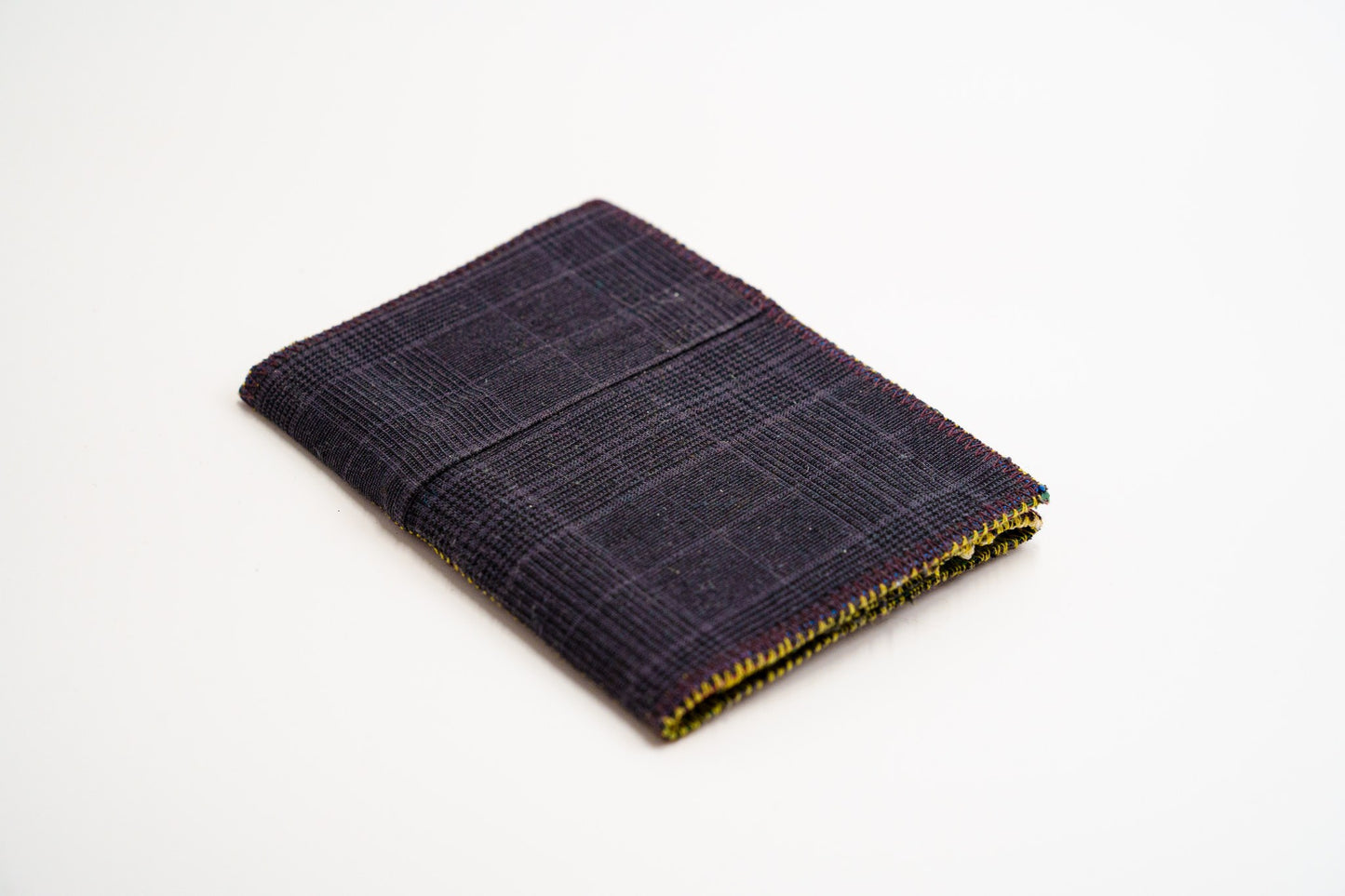 Dark glen-plaid wallet with exposed stitching, handmade from upcycled trouser fabric — HighSew