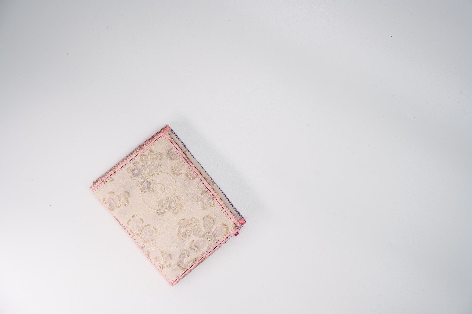 Cream floral wallet with glitter detail, handmade from upcycled fabric — HighSew