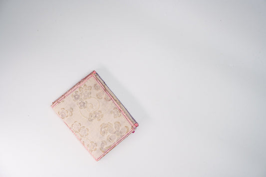 Cream floral wallet with glitter detail, handmade from upcycled fabric — HighSew