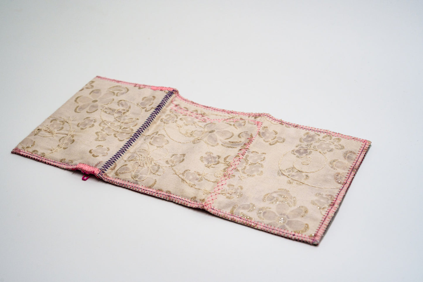 Cream floral glitter exterior of one-of-a-kind upcycled wallet — HighSew